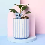 Disney angel flower pot and artificial plant